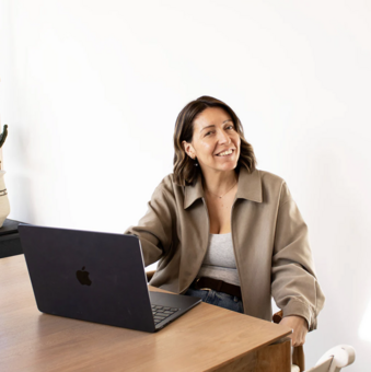 Zoe surrounded by TreatBoxes