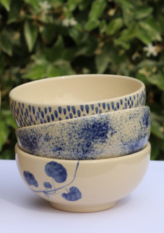 Authentic Vietnamese noodle bowls.  Three different blue design stacked on top of each other
