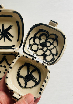 Hand-painted snack bowls in bold geometric black on cream stoneware