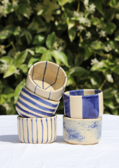 Five different patterned cobalt ceramic bowls with different designs