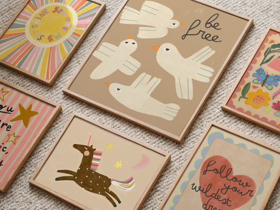 Kids wall art prints with unicorn, birds, sun, and quotes in pastel tones
