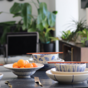 Table setting with blue and cream vietnamese ceramics, bowls, plates and chopsticks