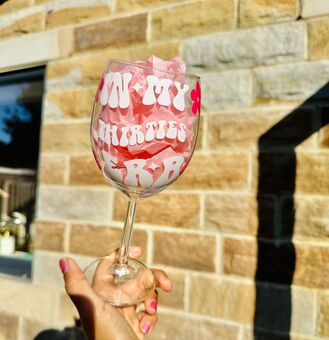Wine glass that says in my thirties era with flowers