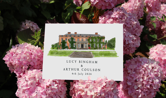 A white A5 card rests atop a bed of pink flowers. On the card is a painting of a building, accompanied by two names and a date.