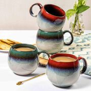 A set of 4 mugs in Reactive glazes
