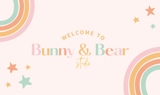 A colourful image of a childrens brand featuring a pink background with pastel coloured rainbows and stars and the words "welcome to Bunny and Bear studio"
