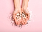 Hands holding glitter