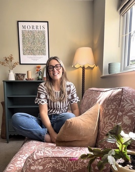 book-lover sat in her cosy book nook reading