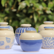 Ceramic Spice Jars sitting on a table with various blue patterns
